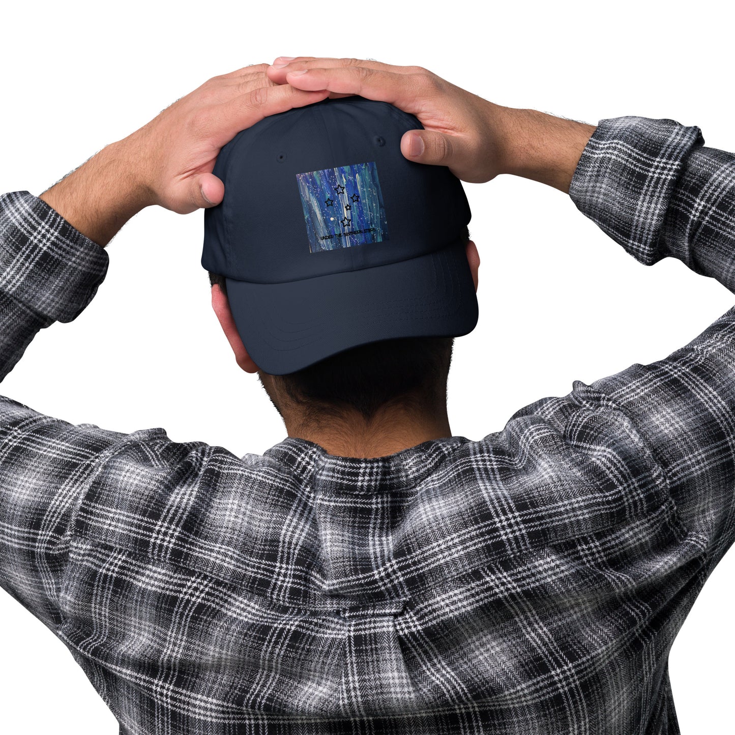 Navy blue adjustable cap with white shooting stars design – original Australian artwork by Ruff Duck Designs