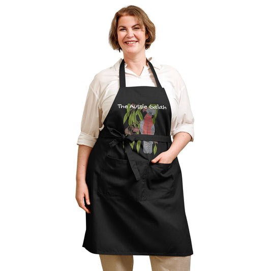 <img src="Aussie galah apron.jpg" alt="drawing of pink and gray galah on front of red or black knee length apron">