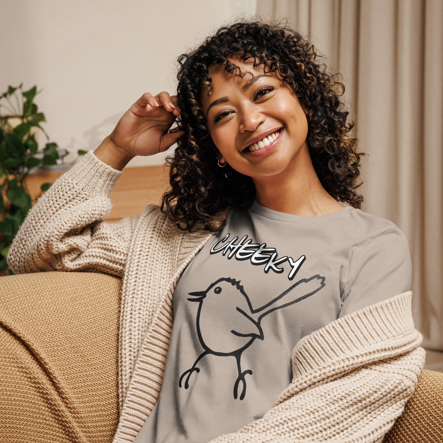 Woman wearing Cheeky Bird relaxed fit t-shirt with Australian graphic design styled casually for everyday wear